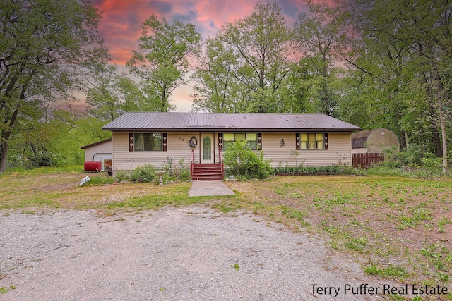 450 Rahn St, Muskegon, MI 49442 - view of front of house with metal roof