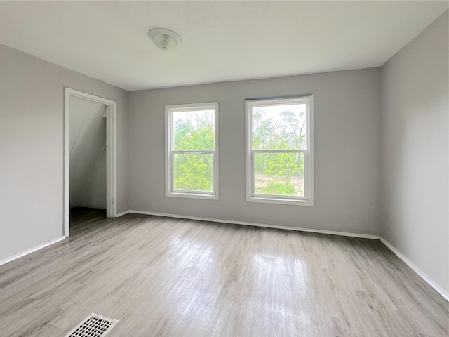 93 Goguac St E, Battle Creek, MI 49015 - unfurnished room with wood finished floors and baseboards