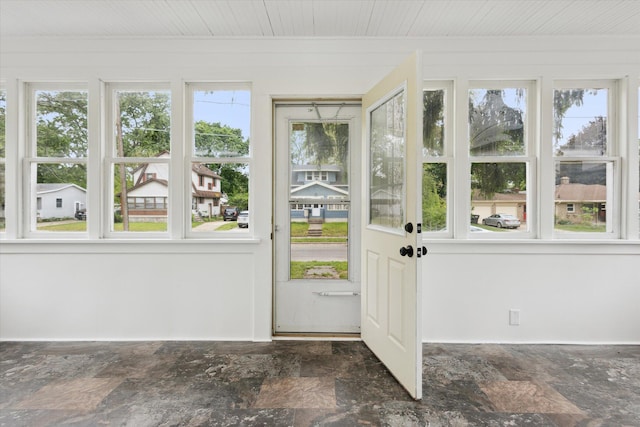 2218 Dalton Ave SW, Wyoming, MI 49519 - doorway to outside with stone finish floors and plenty of natural light