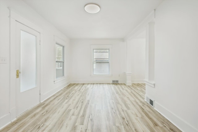 2218 Dalton Ave SW, Wyoming, MI 49519 - empty room with light wood-style flooring and baseboards