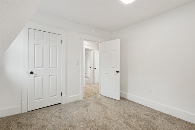 2218 Dalton Ave SW, Wyoming, MI 49519 - unfurnished bedroom featuring carpet flooring and baseboards