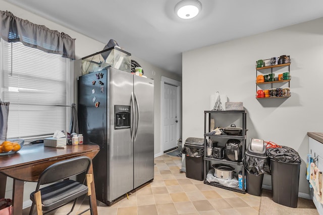 837 Backus St, Jackson, MI 49202 - kitchen featuring stainless steel fridge and an office area