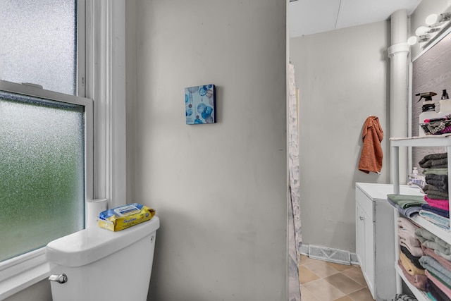 837 Backus St, Jackson, MI 49202 - bathroom featuring toilet, vanity, and tile patterned floors