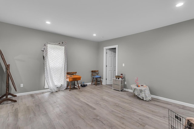 837 Backus St, Jackson, MI 49202 - miscellaneous room featuring wood finished floors, baseboards, and recessed lighting