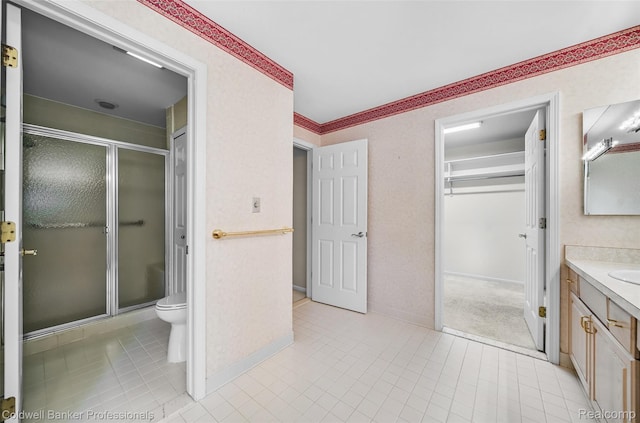 6560 Pleasant Lake Ct Unit 11, West Bloomfield, MI 48322 - bathroom with vanity, toilet, a shower stall, tile patterned floors, and baseboards