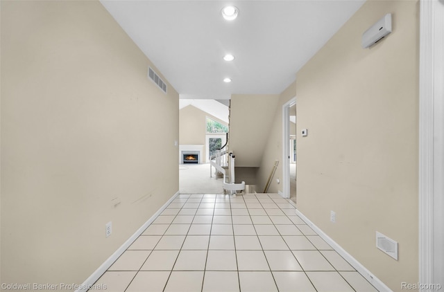 6560 Pleasant Lake Ct Unit 11, West Bloomfield, MI 48322 - unfurnished room with recessed lighting, a lit fireplace, and baseboards