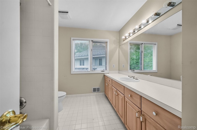 6560 Pleasant Lake Ct Unit 11, West Bloomfield, MI 48322 - bathroom with vanity, toilet, baseboards, tile patterned floors, and shower / tub combination