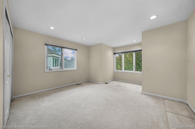 6560 Pleasant Lake Ct Unit 11, West Bloomfield, MI 48322 - carpeted spare room featuring recessed lighting and baseboards