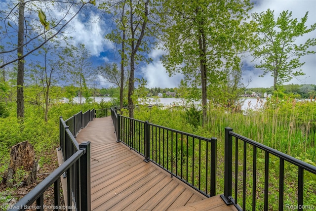 6560 Pleasant Lake Ct Unit 11, West Bloomfield, MI 48322 - wooden deck featuring a water view