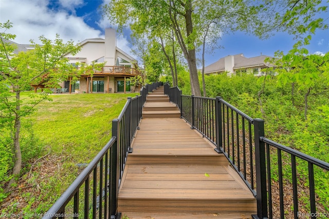 6560 Pleasant Lake Ct Unit 11, West Bloomfield, MI 48322 - wooden terrace featuring a lawn