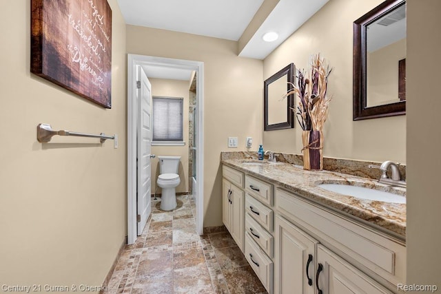 24018 Glen Ridge Ct, Novi, MI 48375 - full bathroom with double vanity, baseboards, stone finish floors, a shower, and toilet