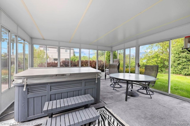 24018 Glen Ridge Ct, Novi, MI 48375 - sunroom / solarium featuring a hot tub, plenty of natural light, and outdoor dining area