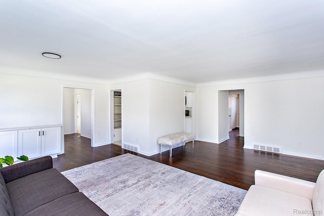 24548 Templar Ave, Southfield, MI 48075 - living room with dark wood-type flooring and baseboards