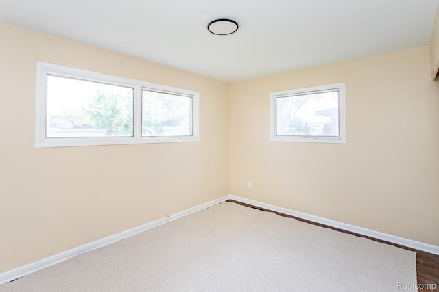 24548 Templar Ave, Southfield, MI 48075 - unfurnished room with plenty of natural light and baseboards