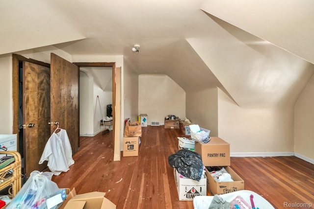 15075 Appoline St, Detroit, MI 48227 - bonus room featuring wood-type flooring, vaulted ceiling, and baseboards