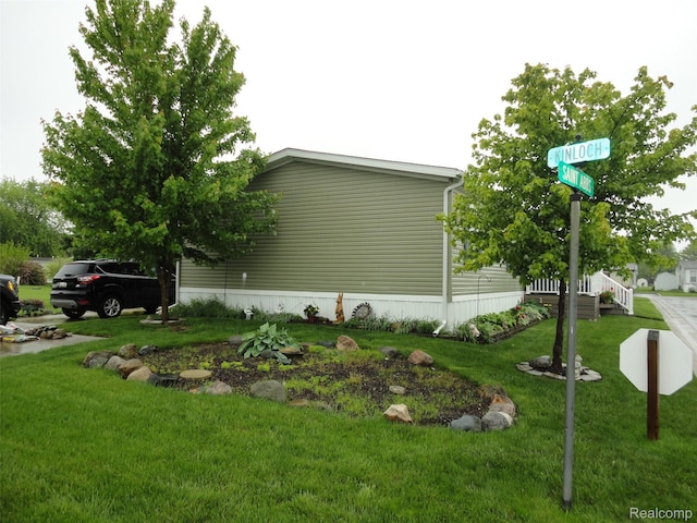 501 Kinloch, Temperance, MI 48182 - view of property exterior featuring a lawn