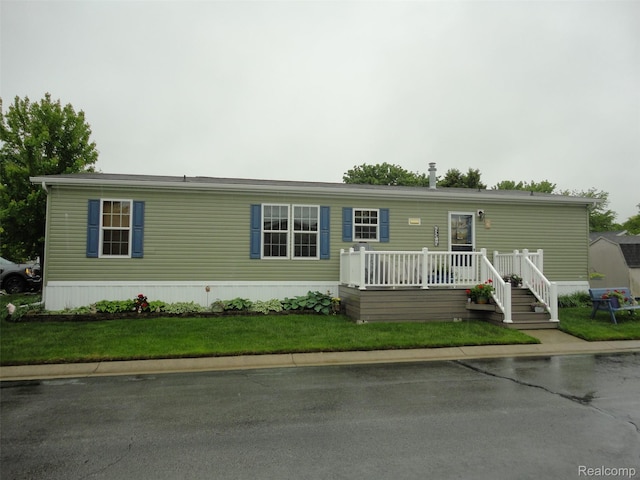 501 Kinloch, Temperance, MI 48182 - manufactured / mobile home featuring a front lawn
