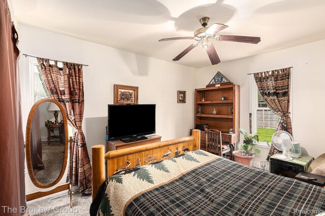 4470 Beach St, Akron, MI 48701 - carpeted bedroom featuring a ceiling fan