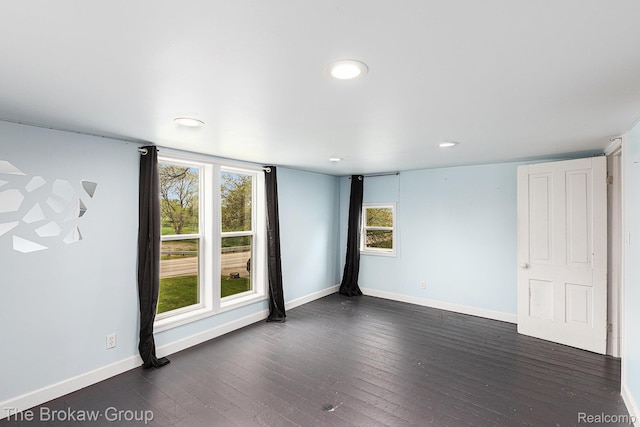 4470 Beach St, Akron, MI 48701 - spare room with dark wood-type flooring, baseboards, and recessed lighting