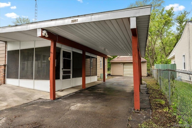 3301 S Kearsley Blvd, Flint, MI 48506 - view of parking / parking lot with a carport