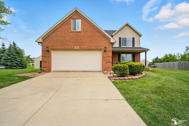 4853 Southpointe Pkwy, Monroe, MI 48161 - traditional home featuring brick siding, a garage, and concrete driveway