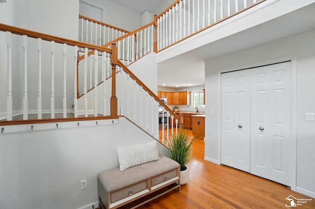 4853 Southpointe Pkwy, Monroe, MI 48161 - staircase featuring wood finished floors and baseboards