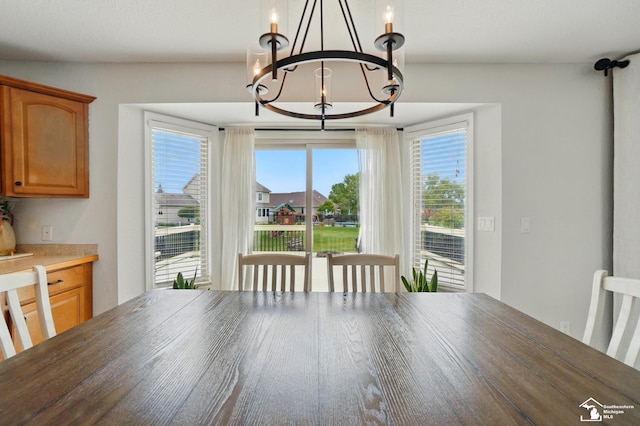 4853 Southpointe Pkwy, Monroe, MI 48161 - dining area featuring a chandelier