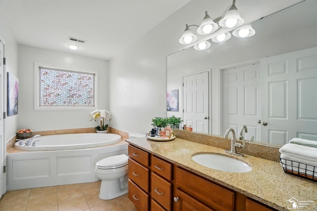 4853 Southpointe Pkwy, Monroe, MI 48161 - full bath featuring tile patterned flooring, vanity, a garden tub, and toilet