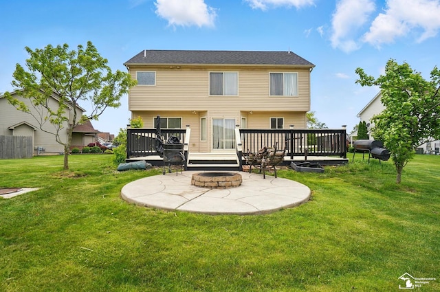 4853 Southpointe Pkwy, Monroe, MI 48161 - back of house featuring an outdoor fire pit, a deck, a patio, and a lawn