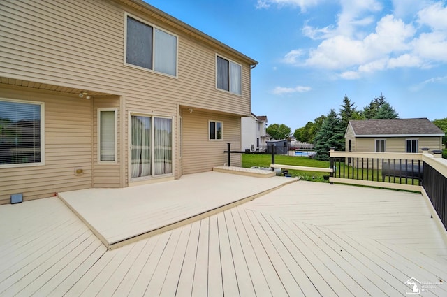 4853 Southpointe Pkwy, Monroe, MI 48161 - wooden deck featuring a lawn and a patio