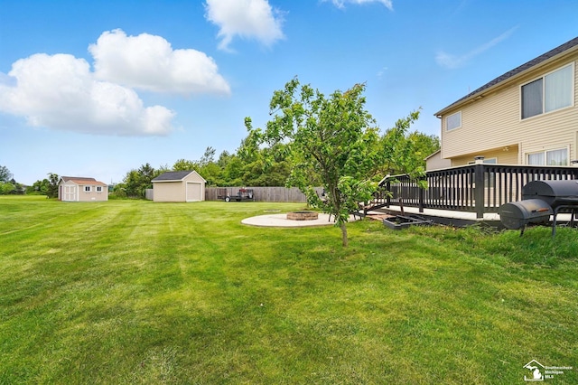 4853 Southpointe Pkwy, Monroe, MI 48161 - view of yard featuring an outdoor fire pit and a deck