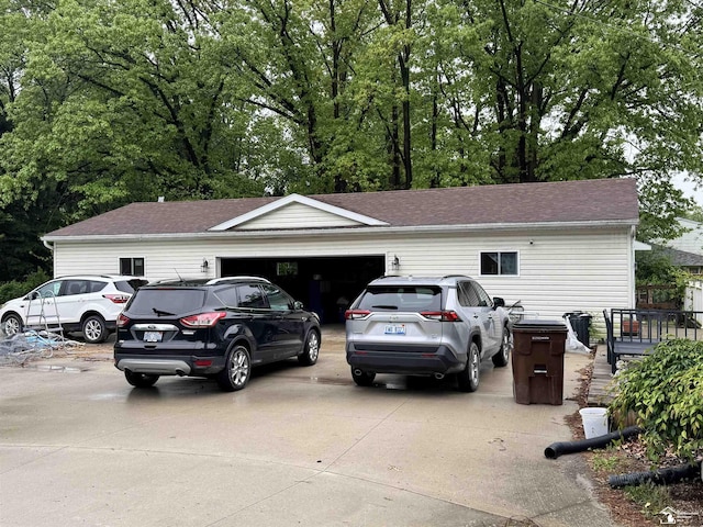 4211 Shelton Dr, Lambertville, MI 48144 - view of front facade featuring an attached garage, driveway, and a shingled roof