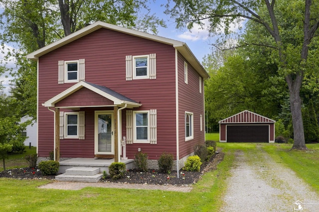 6432 Whiteford Center Rd, Lambertville, MI 48144 - view of front of home with an outdoor structure, a front yard, and a detached garage