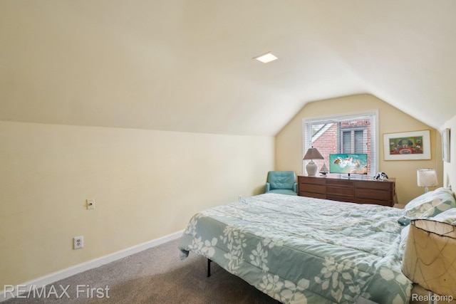 2681 Buckingham Ave, Birmingham, MI 48009 - carpeted bedroom featuring vaulted ceiling and baseboards