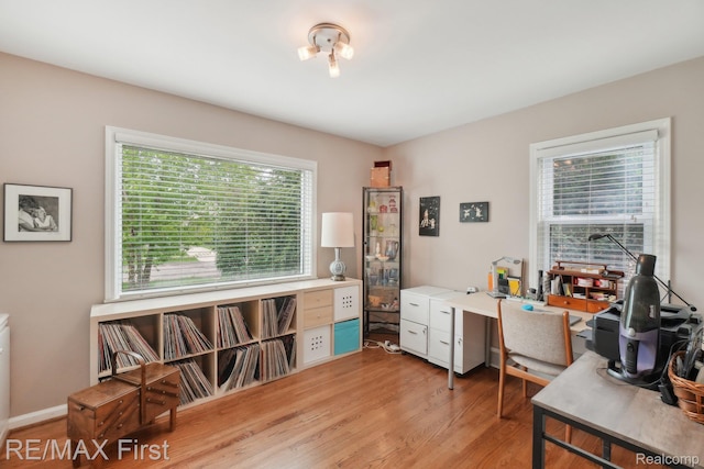 2681 Buckingham Ave, Birmingham, MI 48009 - home office with light wood-style floors