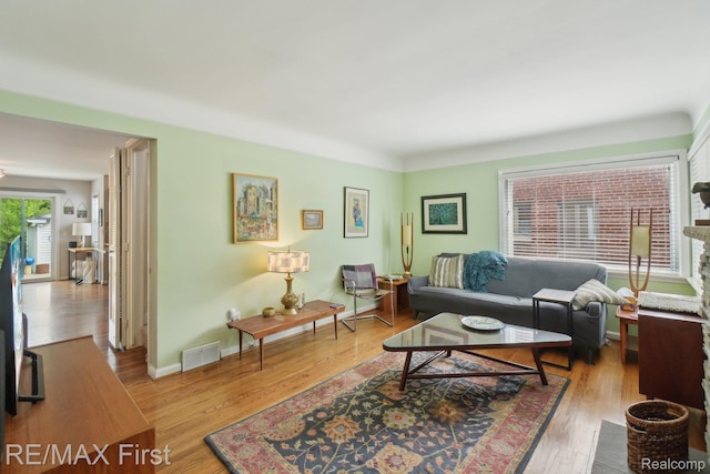 2681 Buckingham Ave, Birmingham, MI 48009 - living area with wood finished floors and baseboards