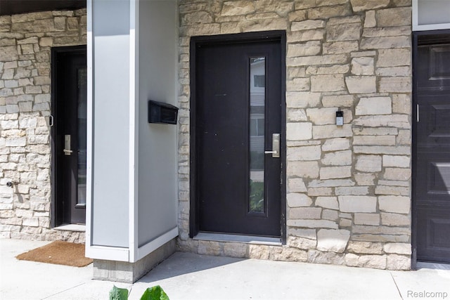 123 Mason Ct Unit 2, Royal Oak, MI 48067 - entrance to property featuring stone siding