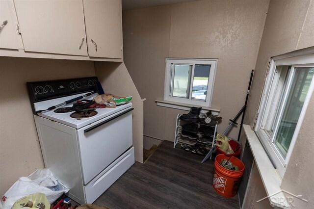 1221 Marsac St, Bay City, MI 48708 - kitchen featuring electric range, dark wood finished floors, and white cabinets