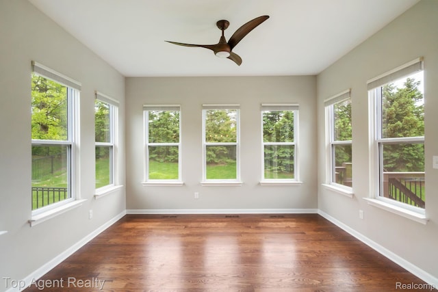 109 Willow Lake Dr, Oxford, MI 48371 - unfurnished sunroom with healthy amount of natural light, wood finished floors, and baseboards