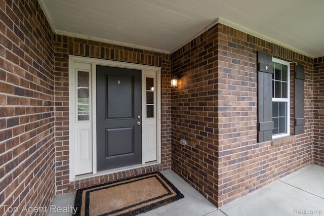 109 Willow Lake Dr, Oxford, MI 48371 - view of exterior entry with brick siding