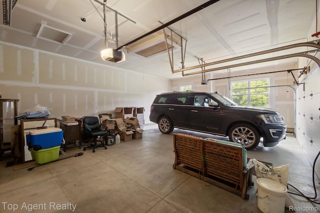 109 Willow Lake Dr, Oxford, MI 48371 - garage featuring a garage door opener