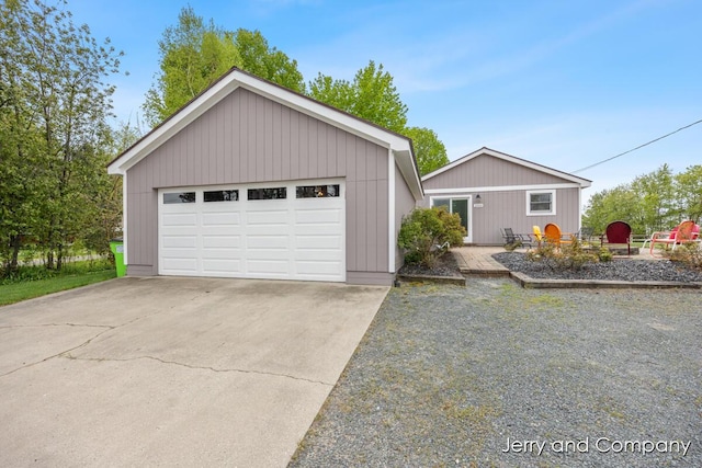 2058 N White Birch Dr, Mears, MI 49436 - view of front of property featuring a garage and an outdoor structure