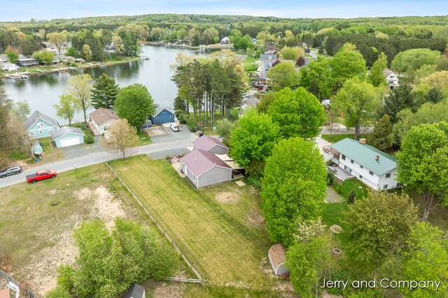 2058 N White Birch Dr, Mears, MI 49436 - aerial view of residential area featuring a nearby body of water and a forest