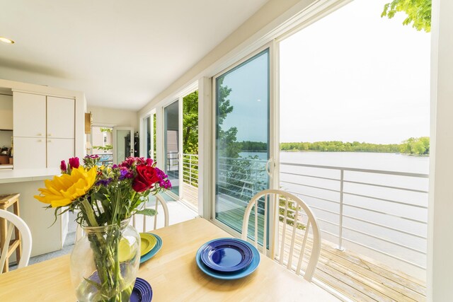 15657 Lakeview Dr, Buchanan, MI 49107 - sunroom featuring healthy amount of natural light and a water view