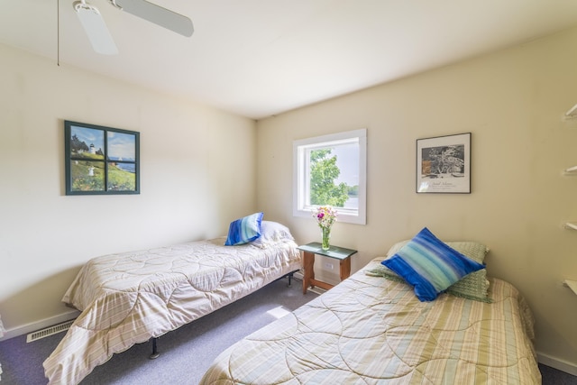 15657 Lakeview Dr, Buchanan, MI 49107 - carpeted bedroom featuring baseboards and ceiling fan