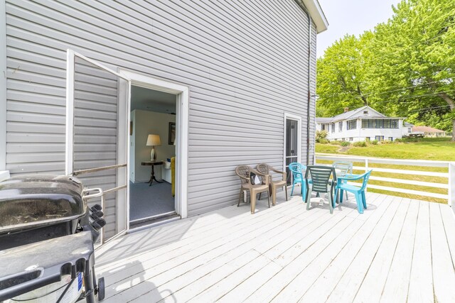 15657 Lakeview Dr, Buchanan, MI 49107 - deck featuring a grill and a lawn