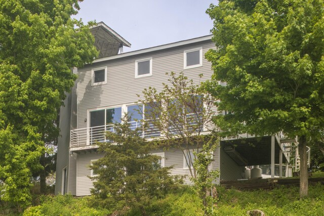 15657 Lakeview Dr, Buchanan, MI 49107 - rear view of property with a balcony