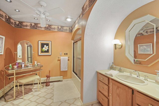 12741 Sharon Hollow Rd, Manchester, MI 48158 - full bathroom featuring recessed lighting, ceiling fan, vanity, shower / bath combination with glass door, and baseboards