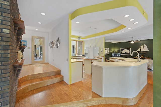 12741 Sharon Hollow Rd, Manchester, MI 48158 - kitchen with a sink, a large island, light wood-style flooring, recessed lighting, and a ceiling fan