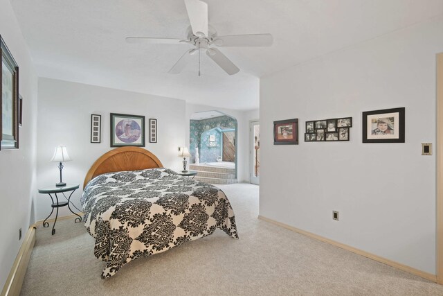12741 Sharon Hollow Rd, Manchester, MI 48158 - carpeted bedroom with baseboards, a baseboard heating unit, and ceiling fan